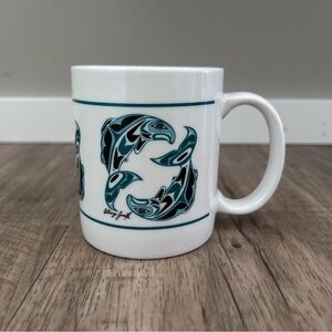 Anthony Joseph Teal Dolphin Coffee Mug Northwest Coast Indigenous-style artwork